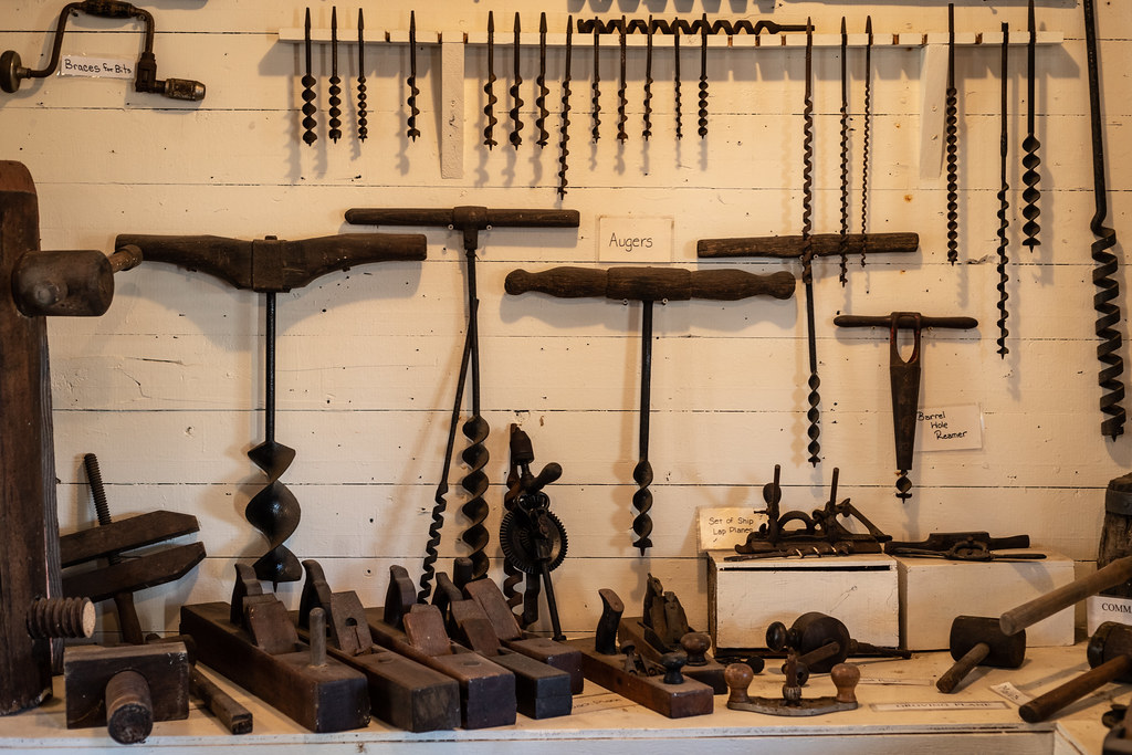 How to Identify Old Antique Tools.

Old tools hanging on a wall, including hammers, augers, chisels, and saws. This image can be used to identify old tools, learn about antique tools, or simply appreciate the craftsmanship of these tools.